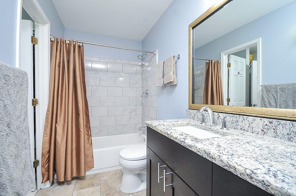 Slide of Artech Roofing & Construction