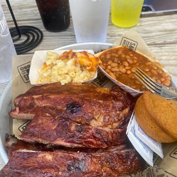 Sam Jones BBQ - 1 lb spare ribs and it comes with 2 sides and either cornbread or a sweet I potato muffin. - Barbeque Near Me - Raleigh, North Carolina Sam Jones BBQ - 1 lb spare ribs and it comes with 2 sides and either cornbread or a sweet I potato muffin. - Barbeque Near Me - Raleigh, North Carolina