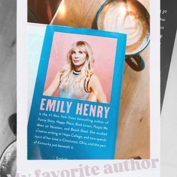 Ascend Coffee - My latte and my book choice for today. - A photo shows a promotional card for author Emily Henry on a table, alongside a coffee cup with latte art and a book titled 'Reading nooks in Indy.' - Coffee & Tea Near Me - Indianapolis, Indiana