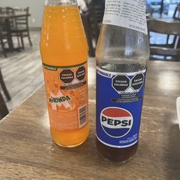 Bottles Mirinda and Pepsi