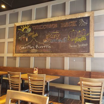First Watch - Some seating and chalkboard awesomeness - Cafes Near Me - Houston, Texas