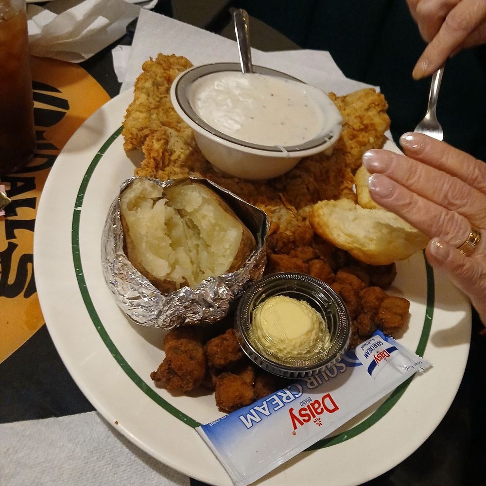 Kendall's Restaurant - Half order chicken fried steak, baked potato, fried hush puppies, gravy on the side. - American Near Me - Noble, Oklahoma
