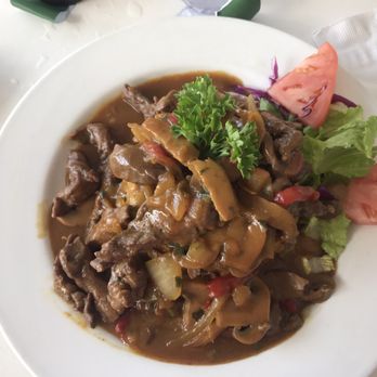 La Parrilla - "Mofongo with steak in mushroom sauce" - Latin American Near Me - Luquillo, Puerto Rico La Parrilla - "Mofongo with steak in mushroom sauce" - Latin American Near Me - Luquillo, Puerto Rico