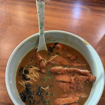 Ramen Bones - Ramen bones Kapolei closeup Of a bowl of Chicken Katsu Curry Ramen inside the broth was The green wakame seaweed. - Noodles Near Me - Kapolei, Hawaii Ramen Bones - Ramen bones Kapolei closeup Of a bowl of Chicken Katsu Curry Ramen inside the broth was The green wakame seaweed. - Noodles Near Me - Kapolei, Hawaii