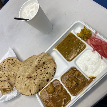 Punjabi Dhaba - Chicken thali and hot roti right from tawa - Indian Near Me - Kingman, Arizona