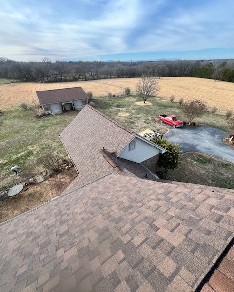 Slide of E. Thompson Roofing