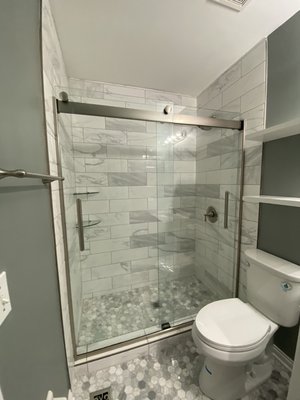 #210254  complete master bathroom remodeling project - This project consisted of the following services
Interior design services
Demolition
Drywall repair
Framing
Patching
Remove and install furnishings and features 
Electrical
Plumbing
Tile/ masonry
Painting
Finishes