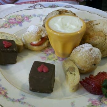 Dartealing Lounge - Sweet plate- petite fours, vanilla scone, biscotti, cream puff, sweet cream - Tea Rooms Near Me - San Francisco, California Dartealing Lounge - Sweet plate- petite fours, vanilla scone, biscotti, cream puff, sweet cream - Tea Rooms Near Me - San Francisco, California