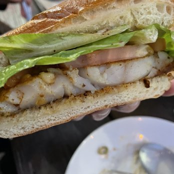 The Blind Pelican - Half of the Blackened grouper sandwich - Seafood Near Me - Holly Springs, North Carolina The Blind Pelican - Half of the Blackened grouper sandwich - Seafood Near Me - Holly Springs, North Carolina