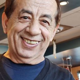 Sam, who has been our server of choice for many years.