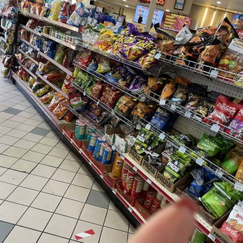 Vallee Food Store - a hand pointing towards a display of snacks - Grocery Near Me - Fresno, California Vallee Food Store - a hand pointing towards a display of snacks - Grocery Near Me - Fresno, California