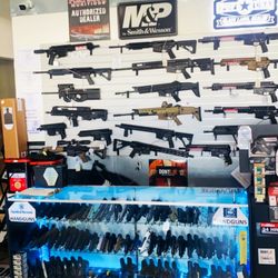 Firearm Central - Assortment of pistols, rifles, and exotic units for sale.