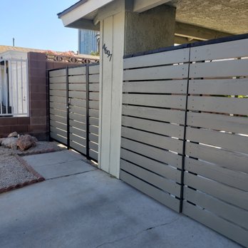 Dwayne Davis Handyman Services - Custom front fence.black steel poles, Grey wood material. gate & e-lock single person entry gate. Las Vegas, NV 2018 - Handyman Near Me Dwayne Davis Handyman Services - Custom front fence.black steel poles, Grey wood material. gate & e-lock single person entry gate. Las Vegas, NV 2018 - Handyman Near Me