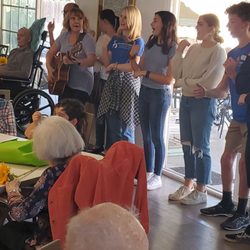 Bubbe & Zayde's place - Families getting together having fun playing the piano, and dancing while activities with Pam!