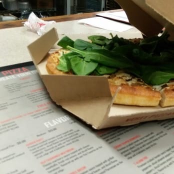 Pizza Hut - a pizza in a box on a table - Pizza Near Me - Brooklyn, Maryland