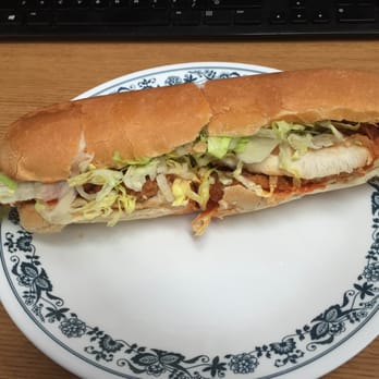 Mike's Pizzeria - Buffalo Chicken Bacon Grinder - side shot. - Pizza Near Me - Manchester, Connecticut Mike's Pizzeria - Buffalo Chicken Bacon Grinder - side shot. - Pizza Near Me - Manchester, Connecticut