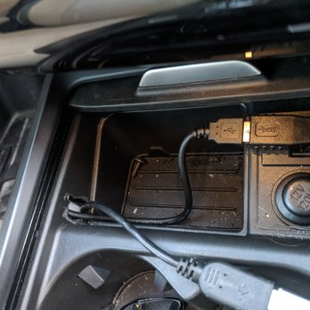 Unavi - Connection routed to covered center console storage. - Car Stereo Installation Near Me - Tustin, California