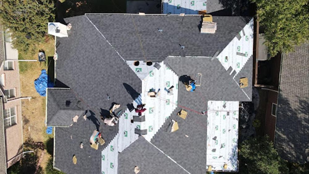 Slide of Status Roofing