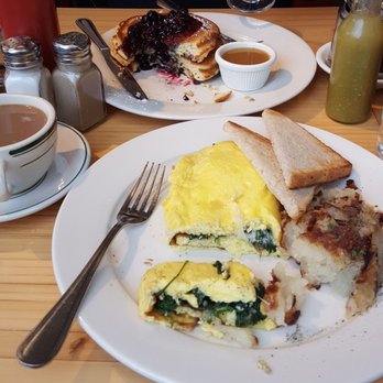 Clinton St. Baking - Blueberry pancakes, spinach mushroom omelette, coffee, and blueberry mimosa - Bakeries Near Me - New York, New York Clinton St. Baking - Blueberry pancakes, spinach mushroom omelette, coffee, and blueberry mimosa - Bakeries Near Me - New York, New York