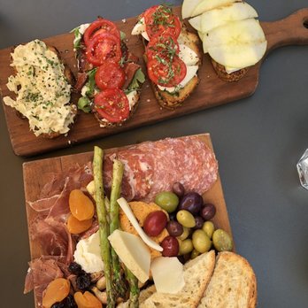 Postino Broadway - Artichoke bruschetta, burrata bacon bruschetta, mozzerella tomato bruschetta, fig apple brie bruschetta, and the Butcher's Block - Wine Bars Near Me - Denver, Colorado Postino Broadway - Artichoke bruschetta, burrata bacon bruschetta, mozzerella tomato bruschetta, fig apple brie bruschetta, and the Butcher's Block - Wine Bars Near Me - Denver, Colorado