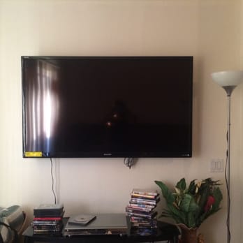 TV Installations - 60" mounted with wire concealment :) My wires are only showing until I get a new DVD player. I couldn't use an HDMI cable :( - Home Theatre Installation Near Me