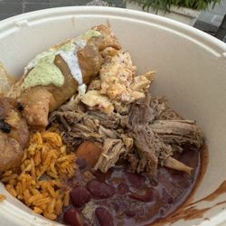 Lechon, beef empanada, plantains Madura, beans, rice, macaroni salad, all were delicious!