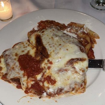 Villa Berulia - Chicken Parmesan with Penne pasta - Italian Near Me - New York, New York Villa Berulia - Chicken Parmesan with Penne pasta - Italian Near Me - New York, New York