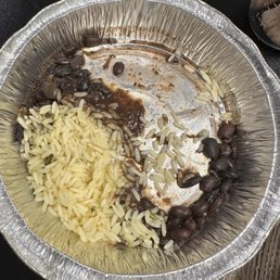 Rice and beans from a kids quesadilla plate Rice and beans from a kids quesadilla plate