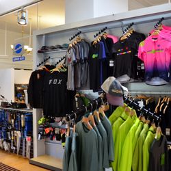 Papa Wheelies Bicycle Shop - Service Department and Apparel Display.