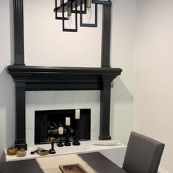 Holloway Construction Group - Fireplace restoration, lighting, and paint.