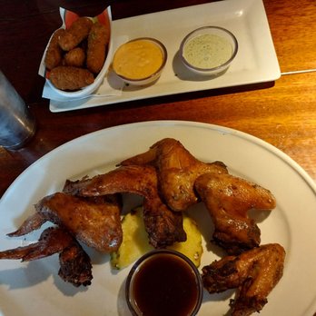 Bahama Breeze - Jerk wings and Yuca cheese sticks - Bars Near Me - Tukwila, Washington Bahama Breeze - Jerk wings and Yuca cheese sticks - Bars Near Me - Tukwila, Washington