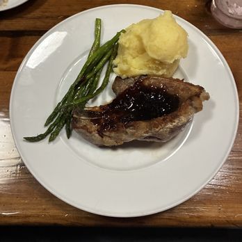 Harry's Grille & Tavern - Pan Seared Bone In Pork Chop - Bars Near Me - Charlotte, North Carolina