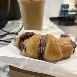 Seleno - A chocolate swirled croissant and the Apple Butter Latte, iced.