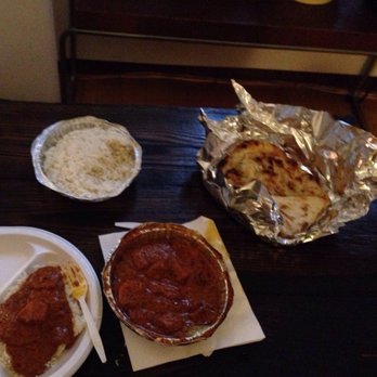 Taj Indian Cuisine - Chicken tikka masala, garlic Naan and rice. - Indian Near Me - Ottawa, Ontario Taj Indian Cuisine - Chicken tikka masala, garlic Naan and rice. - Indian Near Me - Ottawa, Ontario
