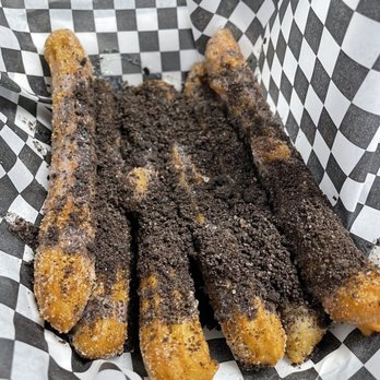 Dulce Canella - 6 churros with lechera and Oreo crumbs - Ice Cream & Frozen Yogurt Near Me - Norwalk, California Dulce Canella - 6 churros with lechera and Oreo crumbs - Ice Cream & Frozen Yogurt Near Me - Norwalk, California