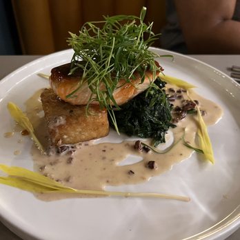Dovetail Bar & Restaurant - Salmon on top of a grit cake with kale - New American Near Me - Washington, DC, District of Columbia