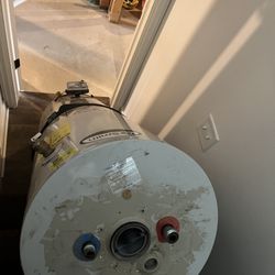 Haul It All - Replacing old water heater and carrying out of the basement.