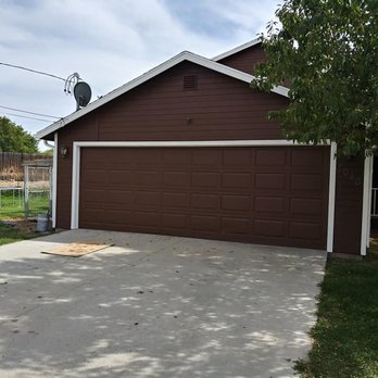 Offroad Painting and remodeling - a brown garage with white trim - Painters Near Me Offroad Painting and remodeling - a brown garage with white trim - Painters Near Me