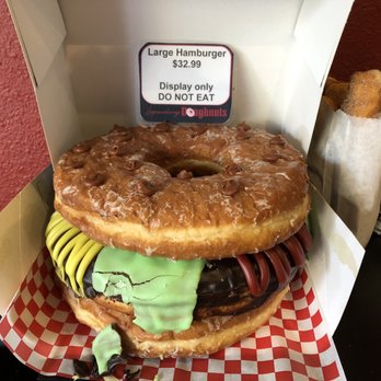Legendary Doughnuts - Large hamburger example. Three 9" diameter donuts. - Donuts Near Me - Tacoma, Washington Legendary Doughnuts - Large hamburger example. Three 9" diameter donuts. - Donuts Near Me - Tacoma, Washington