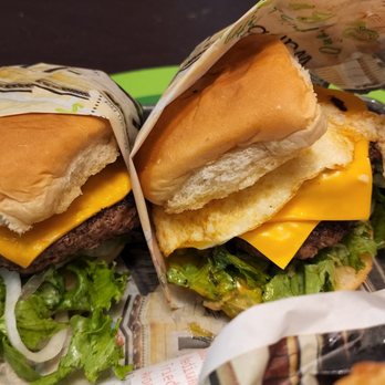 Wahlburgers - Our burger (L) double decker (R) - American Near Me - Cabazon, California Wahlburgers - Our burger (L) double decker (R) - American Near Me - Cabazon, California