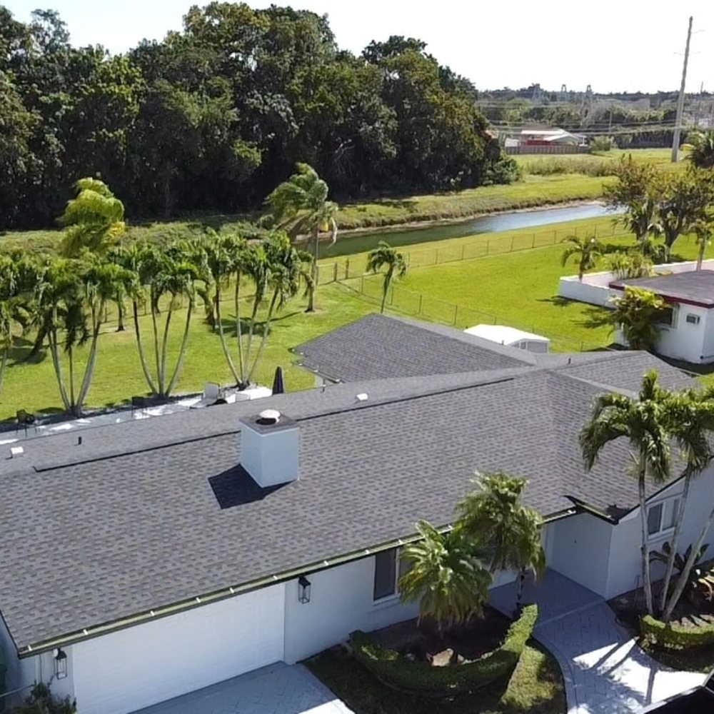 Slide of Molina's Roofing Services