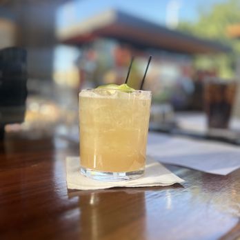 Redwood Cafe - a cocktail with a lime garnish - New American Near Me - Modesto, California
