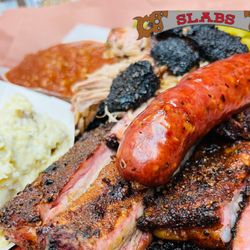 Slabs - Bo Junior Feast features three slices of the best smoked Beef brisket, half rack of bbq ribs, bbq pulled pork, jalapeno sausage w cheese