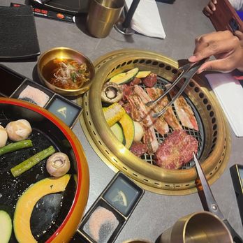 Y Space BBQ - BBQ station with meats and partial view of the veggie platter - Barbeque Near Me - Flushing, New York Y Space BBQ - BBQ station with meats and partial view of the veggie platter - Barbeque Near Me - Flushing, New York