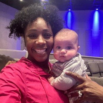 Harvest Church - Holding a baby in harvest church - Churches Near Me - Elk Grove, California Harvest Church - Holding a baby in harvest church - Churches Near Me - Elk Grove, California
