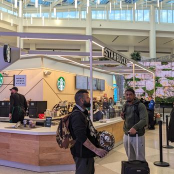 Starbucks - Palm Court in MCO Terminal C - Coffee & Tea Near Me - Orlando, Florida Starbucks - Palm Court in MCO Terminal C - Coffee & Tea Near Me - Orlando, Florida