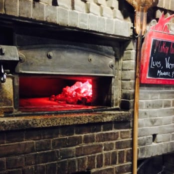 Juliana's - Where the magic happens! This is the pizza oven. - Pizza Near Me - Brooklyn, New York Juliana's - Where the magic happens! This is the pizza oven. - Pizza Near Me - Brooklyn, New York