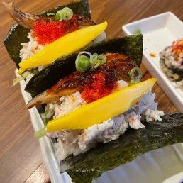 Sushi tacos with crab meat and mango  Fresh of everything