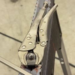 Ace Hardware - A more complex extraction. Ground a slot in the exposed bolt and a flat Craftsman screwdriver did the trick.