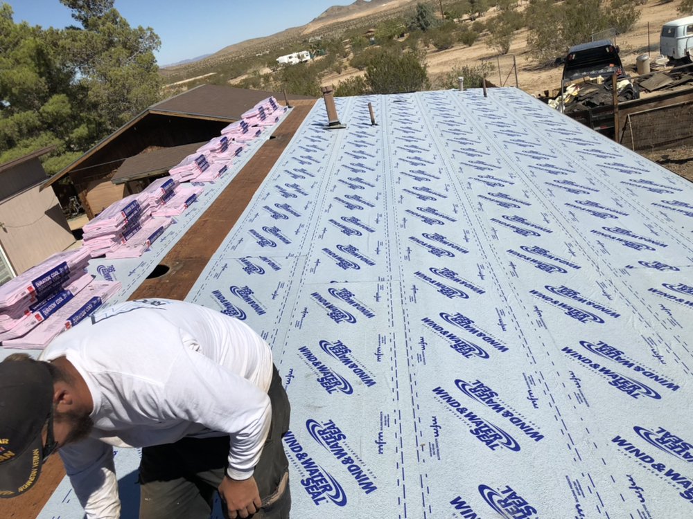 Slide of AMG Roofing